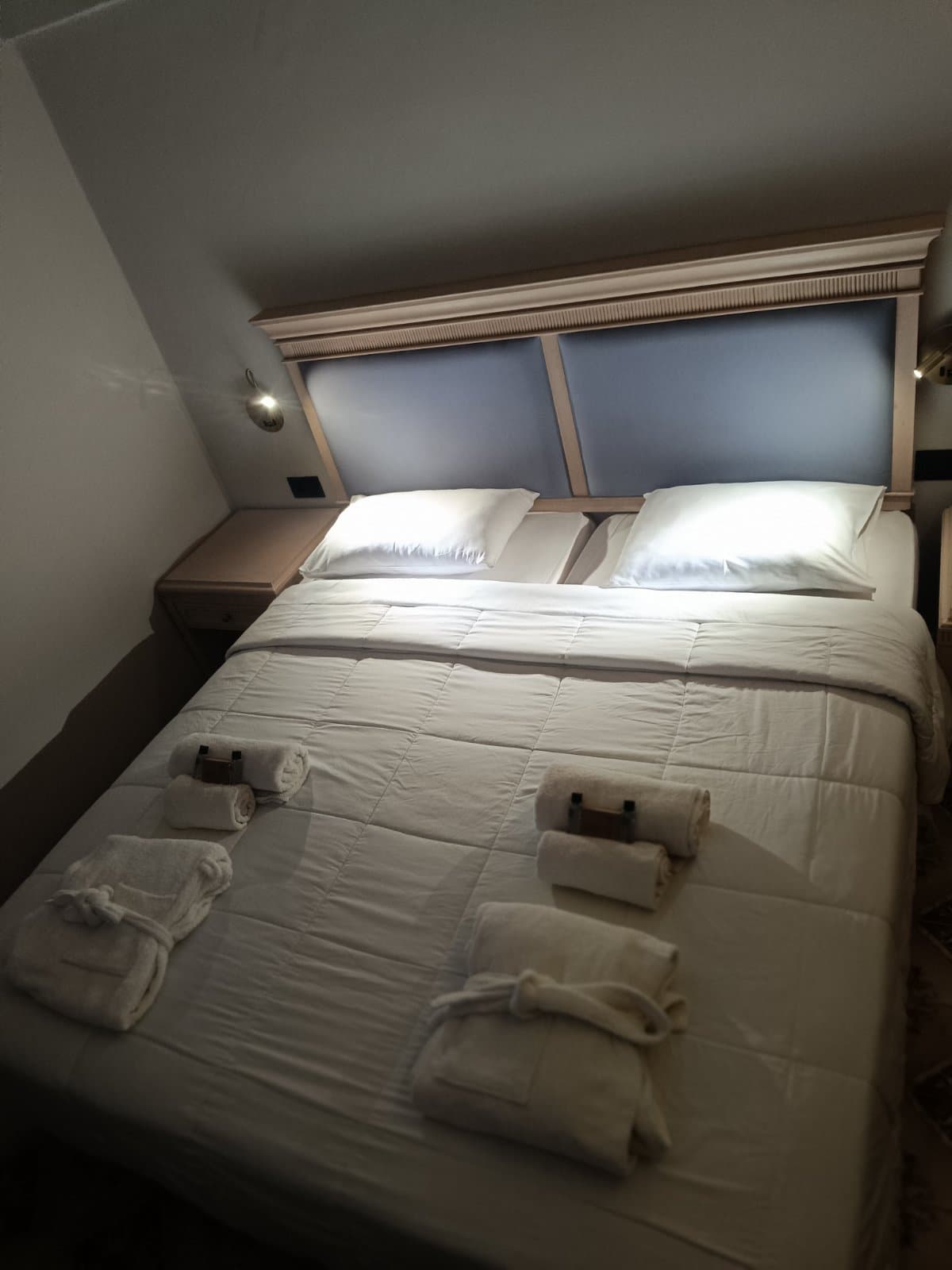 Junior Suite bed with soft headboard